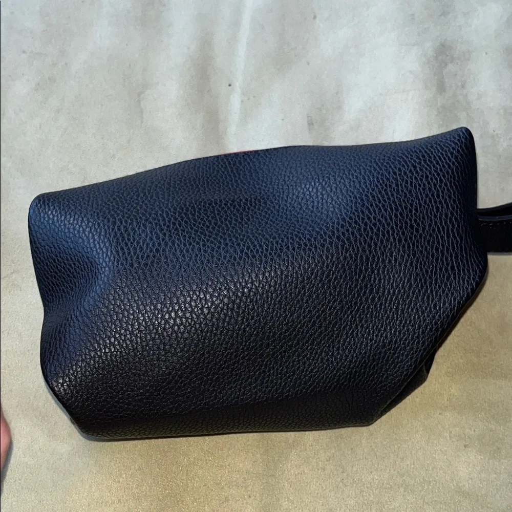TUMI Textured Black Faux Leather toiletrie / travel bag
